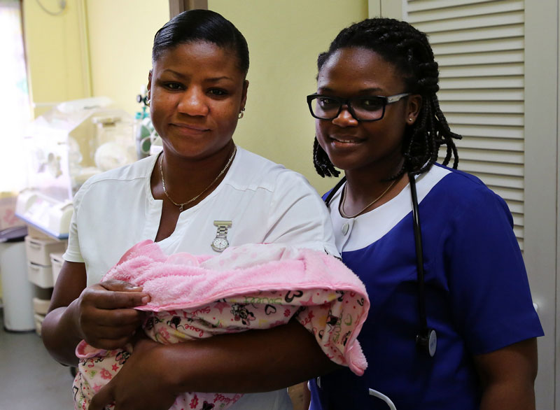 Mother and child in health care setting