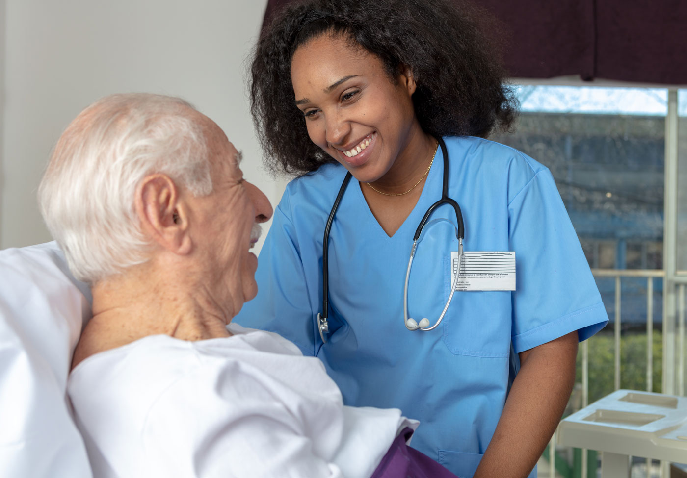 older adult receives health care